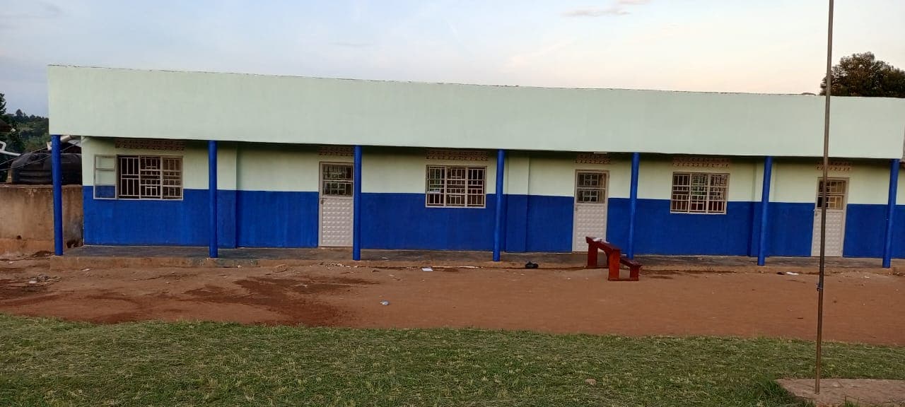 White-and-blue school classroom block supported by KOOK Foundation