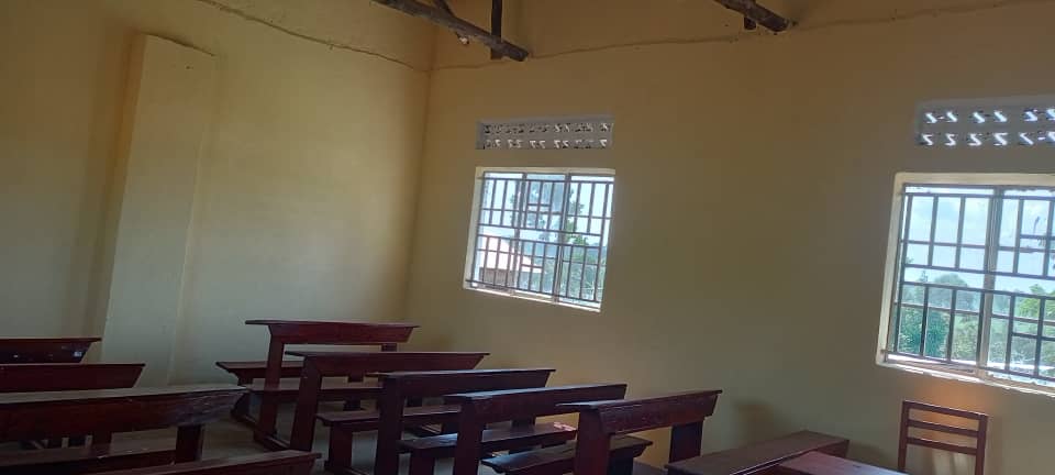 Classroom rows of dual-pupil wooden desks