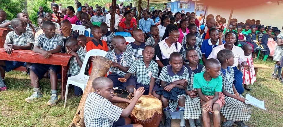 A wide view of pupils gathered on the St. Mary's school compound