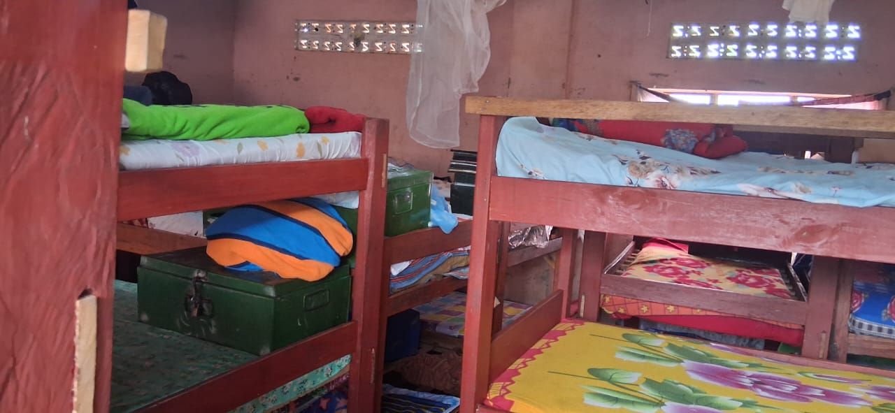 Bunk beds filling a crowded St. Mary's dormitory room