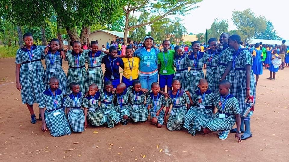 Pupils posing together on the school grounds