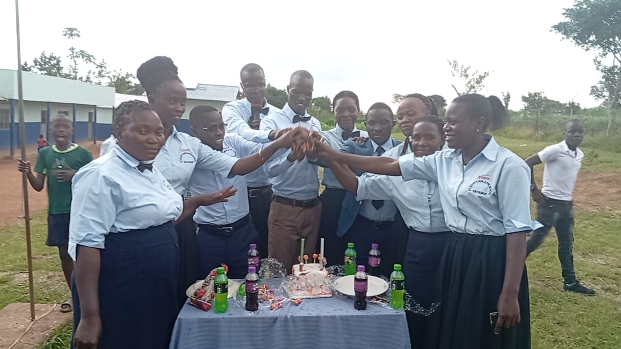 St. Mary's staff celebrating together on the school grounds