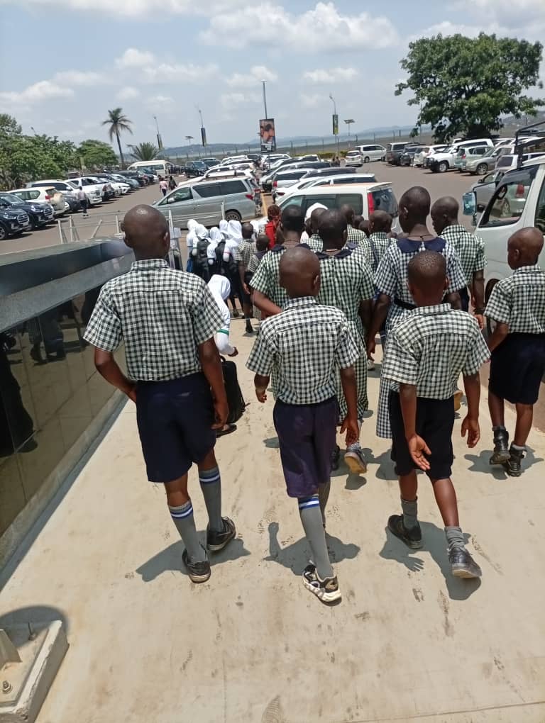 A wide view of pupils gathered on the St. Mary's school compound
