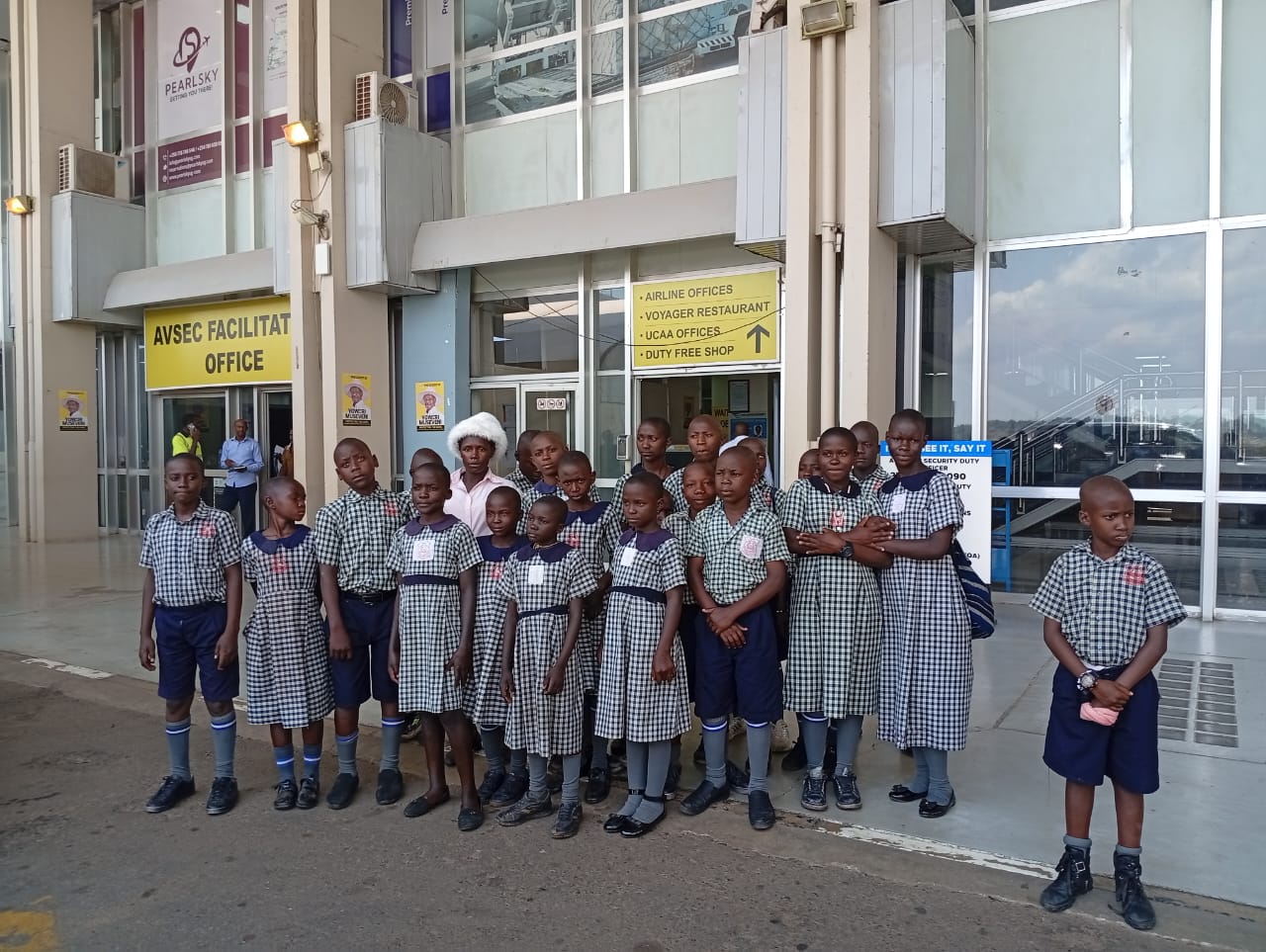 Pupils on an educational excursion at Entebbe International Airport