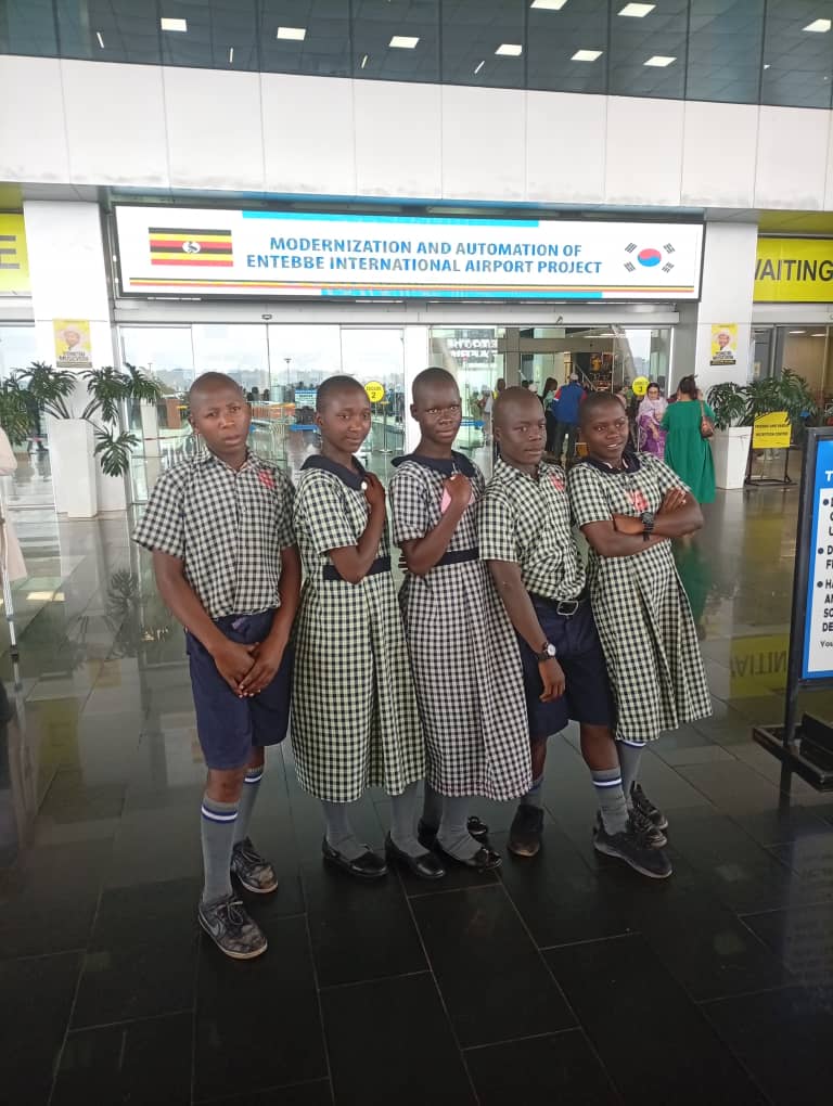 Pupils on an educational excursion at Entebbe International Airport