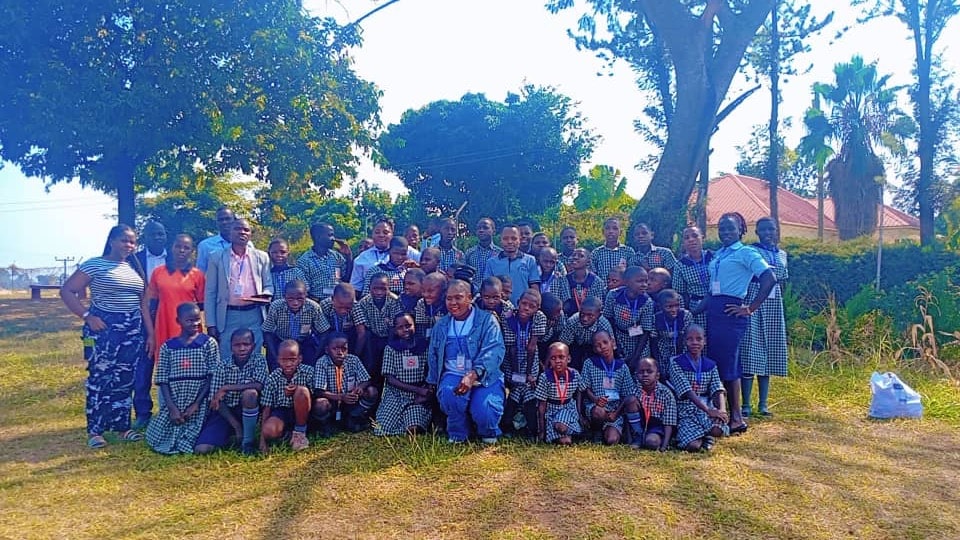 Pupils gathered together on the school field
