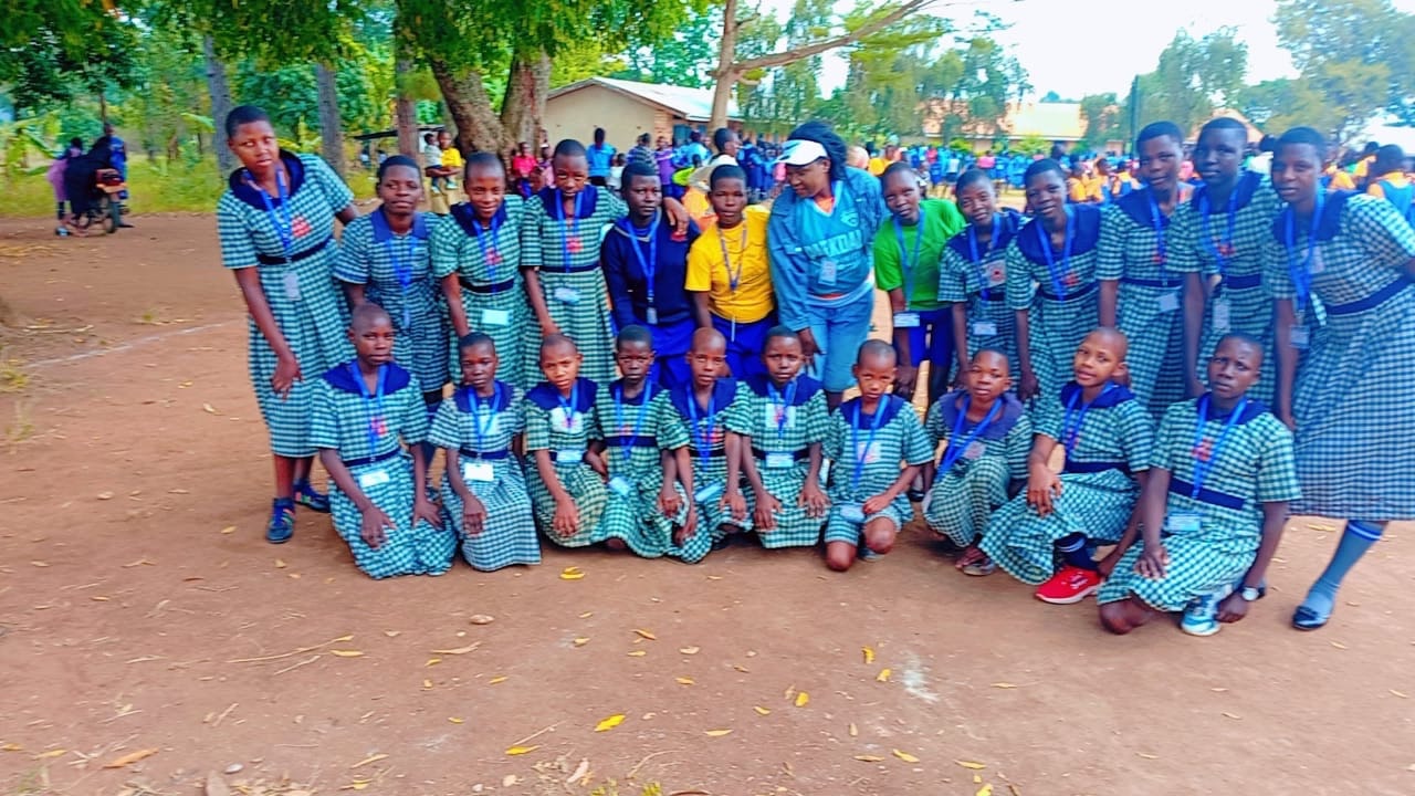 Pupils of St. Mary's Nursery and Primary School gathered joyfully on the school grounds in Kikyamuzi