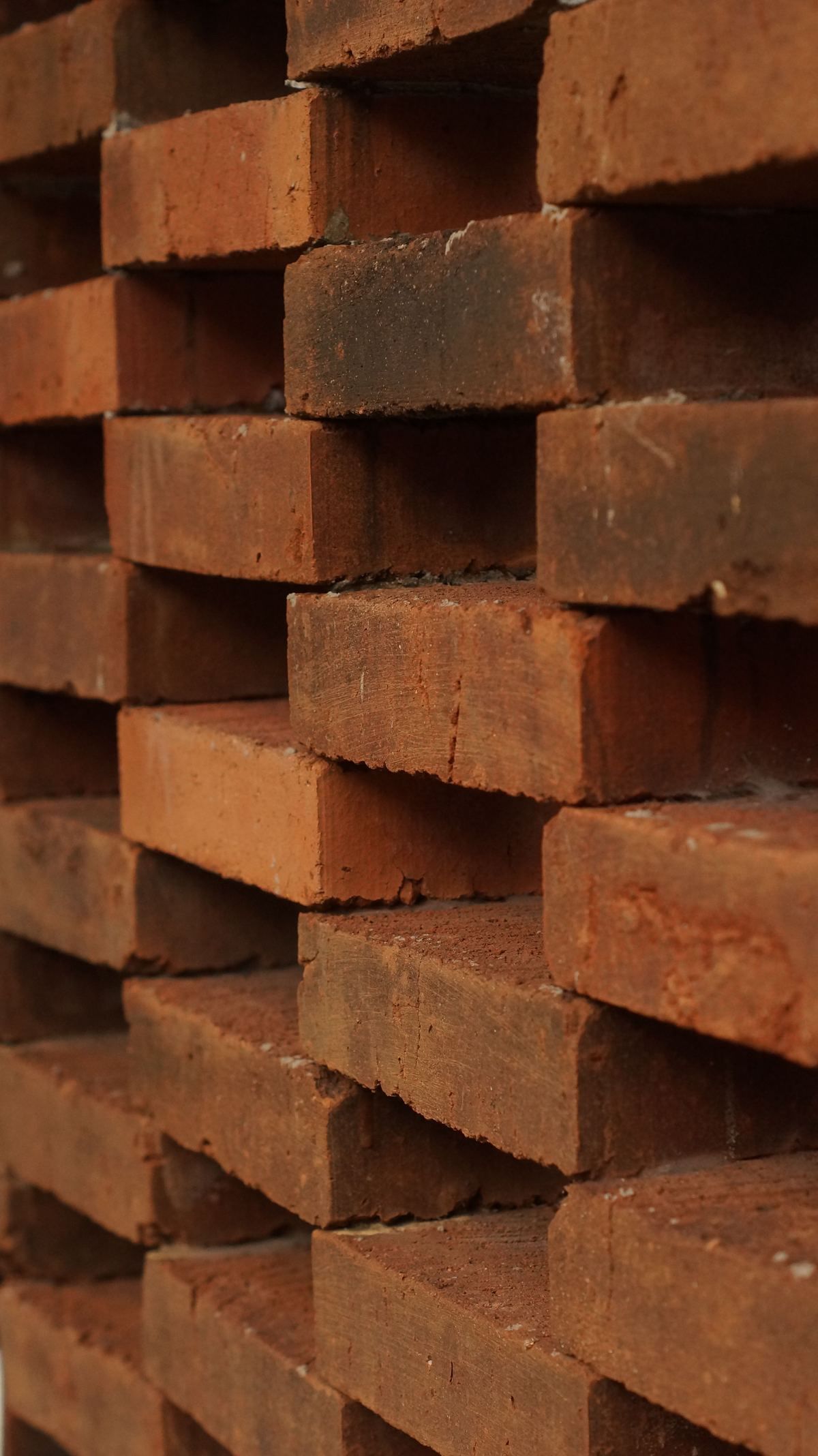 Stacked bricks, representing the ongoing construction of St. Mary's classrooms